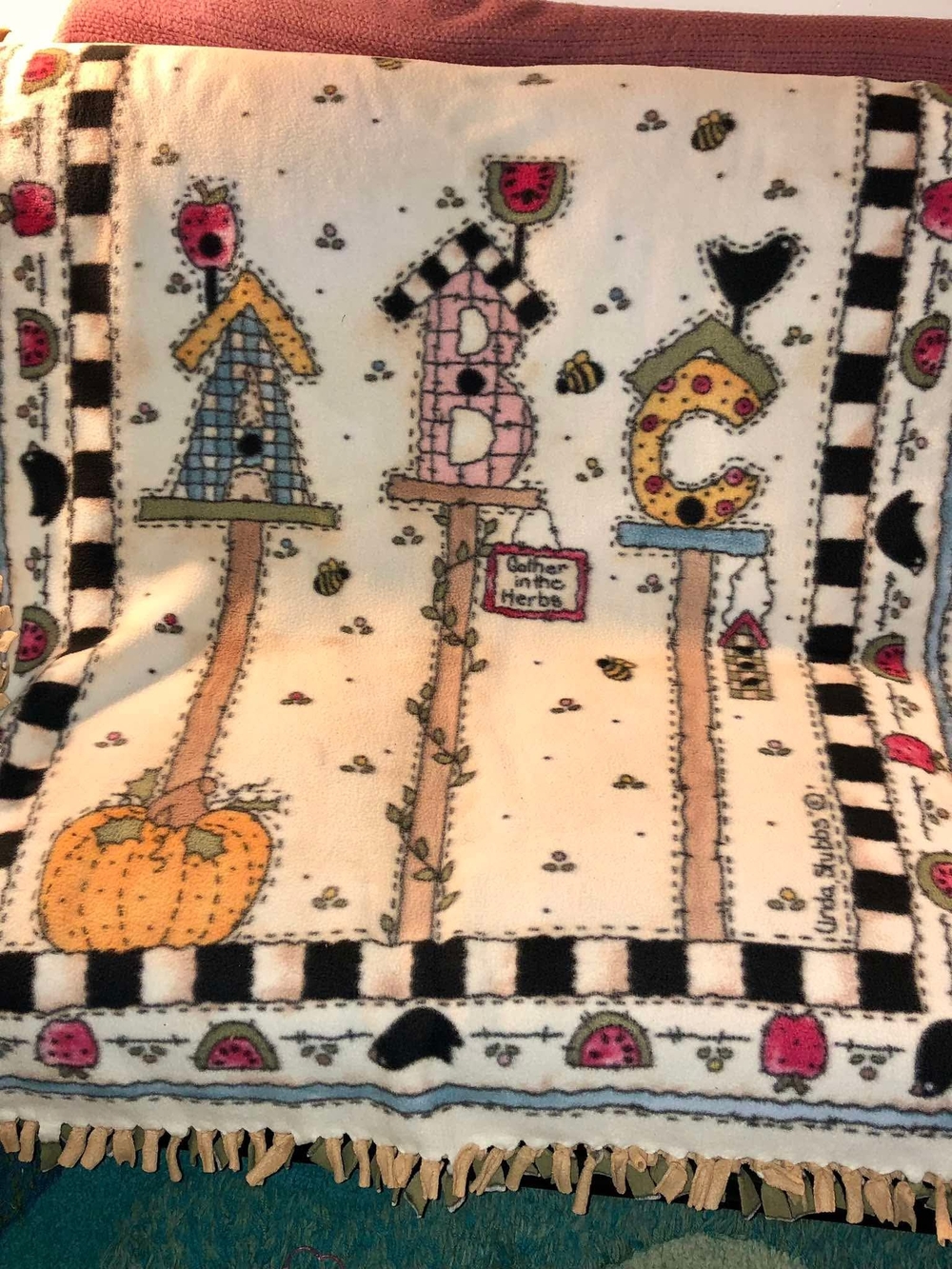 fleece tie-blanket featuring a "Birdhouse Bungalow" 55x42in